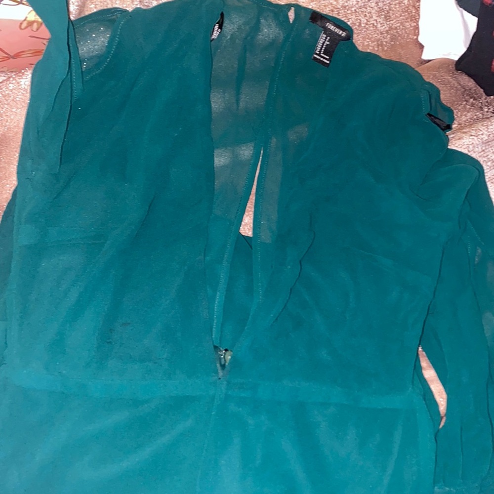 Forest green long sleeve wide leg jumpsuit .Sheer material